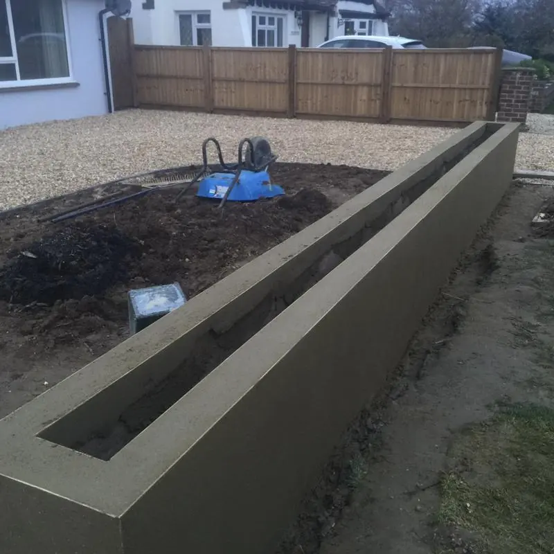 A block wall planter, built while we were there doing the fencing
