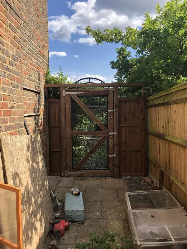 A screen panel the customer bought, built into a gate frame on site